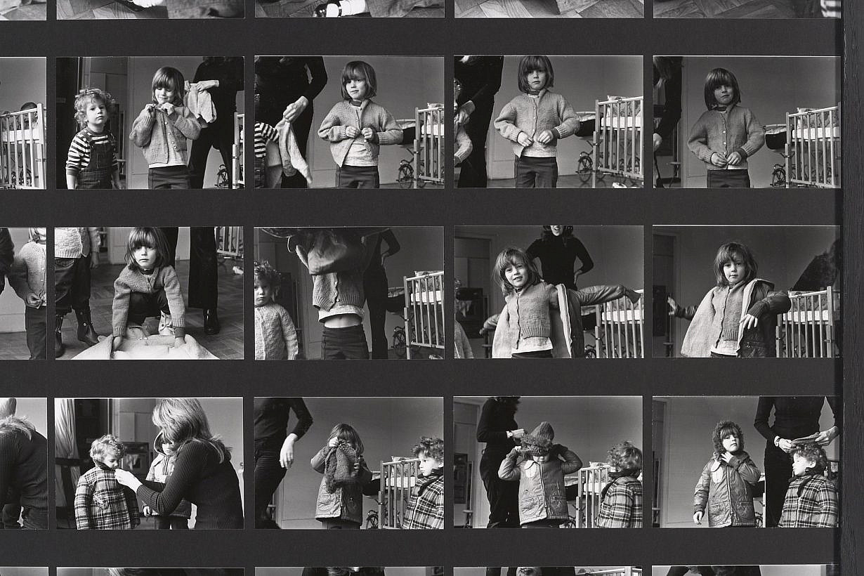 Mierle Laderman Ukeles, Dressing to Go Out/Undressing to Go In, 1973, detail. Black-and-white photos mounted on foam core with chain and dust rag, 55 x 42 1/4 inches. Original black-and-white photographs: Joshua Siderowitz. Installation photo: Jeffrey Sturges © Mierle Laderman Ukeles. Courtesy the artist and Ronald Feldman Gallery, New York, NY Mierle Laderman Ukeles, Dressing to Go Out/Undressing to Go In, 1973, detail. Black-and-white photos mounted on foam core with chain and dust rag, 55 x 42 1/4 inches. Original black-and-white photographs: Joshua Siderowitz. Installation photo: Jeffrey Sturges © Mierle Laderman Ukeles. Courtesy the artist and Ronald Feldman Gallery, New York, NY